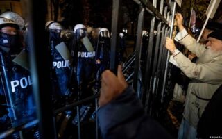 Poland Protesters Clash With Police Over Court Chief Suspension