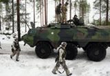 UK Chancellor Healey Orders 1% Cuts to Fund Defence